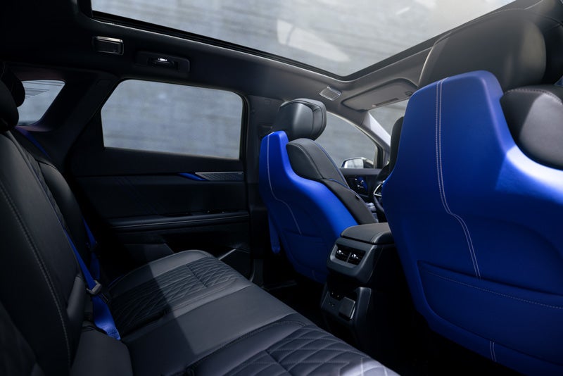 Back Seat View of the 2026 OPTIQ-V Blue Front Seats, Sun Roof, and Interior | Camargo Cadillac in CINCINNATI OH